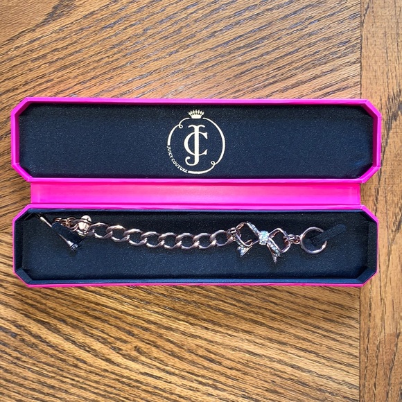 Juicy Couture Jewelry - Juicy Couture Crystal Bow Rose Gold Charm Bracelet